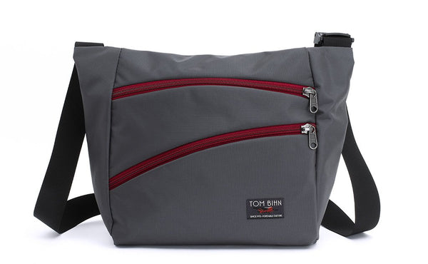 Icon in Nebulous Grey (dark grey) 525 Ballistic with Iberian (red) zippers.
